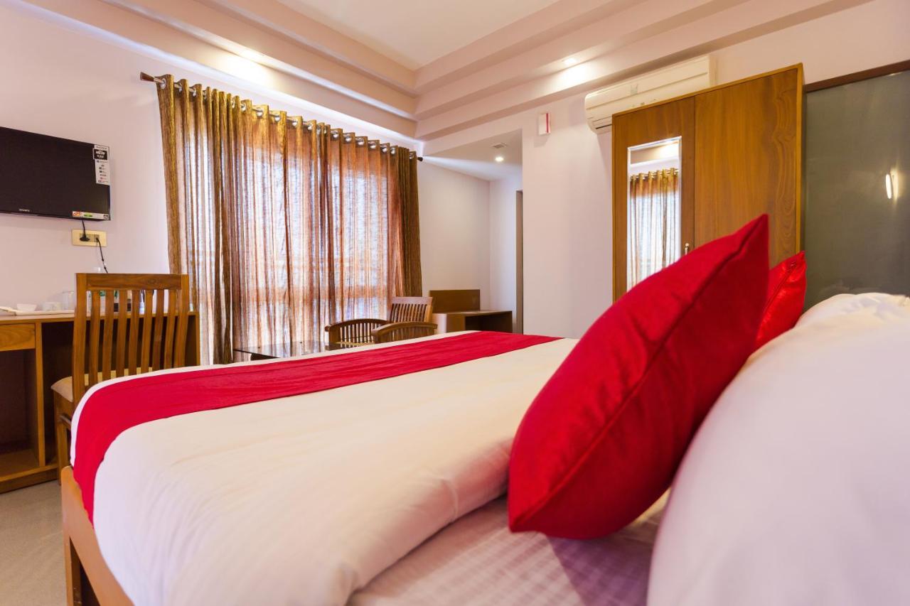Hotel Garden Inn Коччи Экстерьер фото