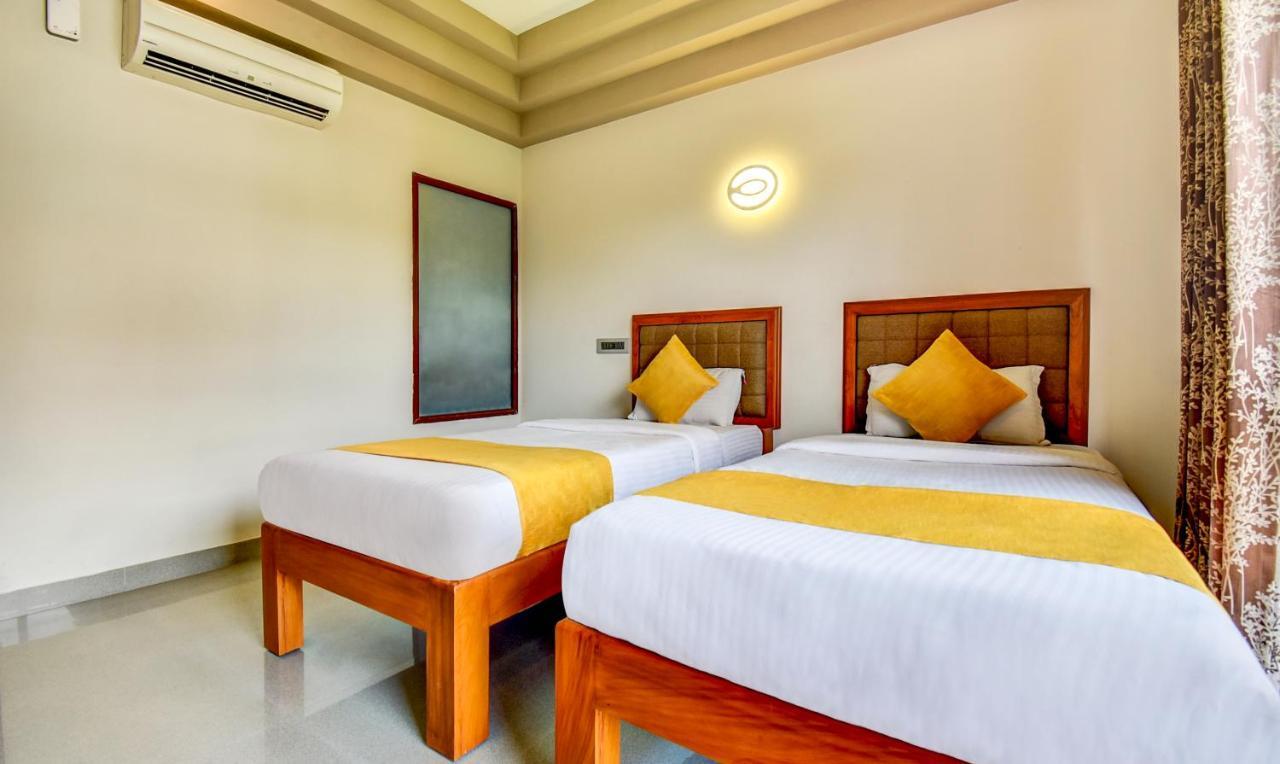 Hotel Garden Inn Коччи Экстерьер фото