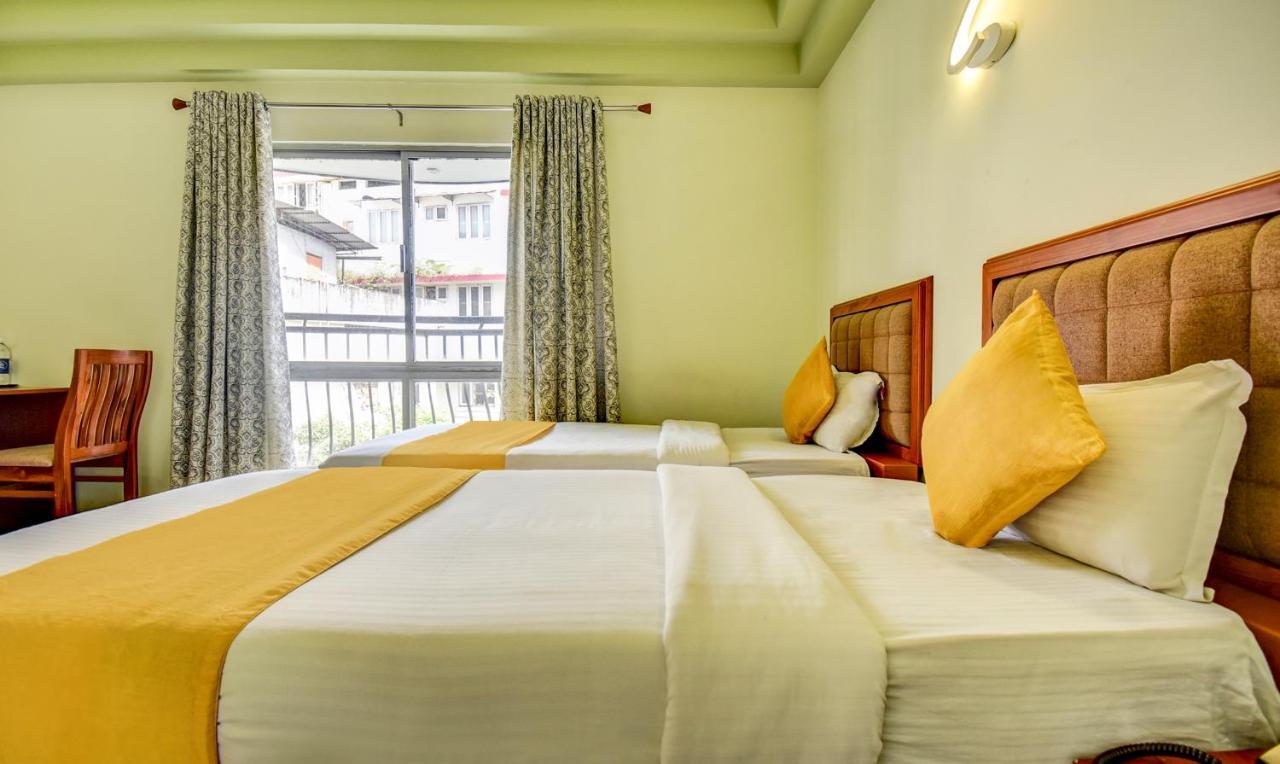 Hotel Garden Inn Коччи Экстерьер фото