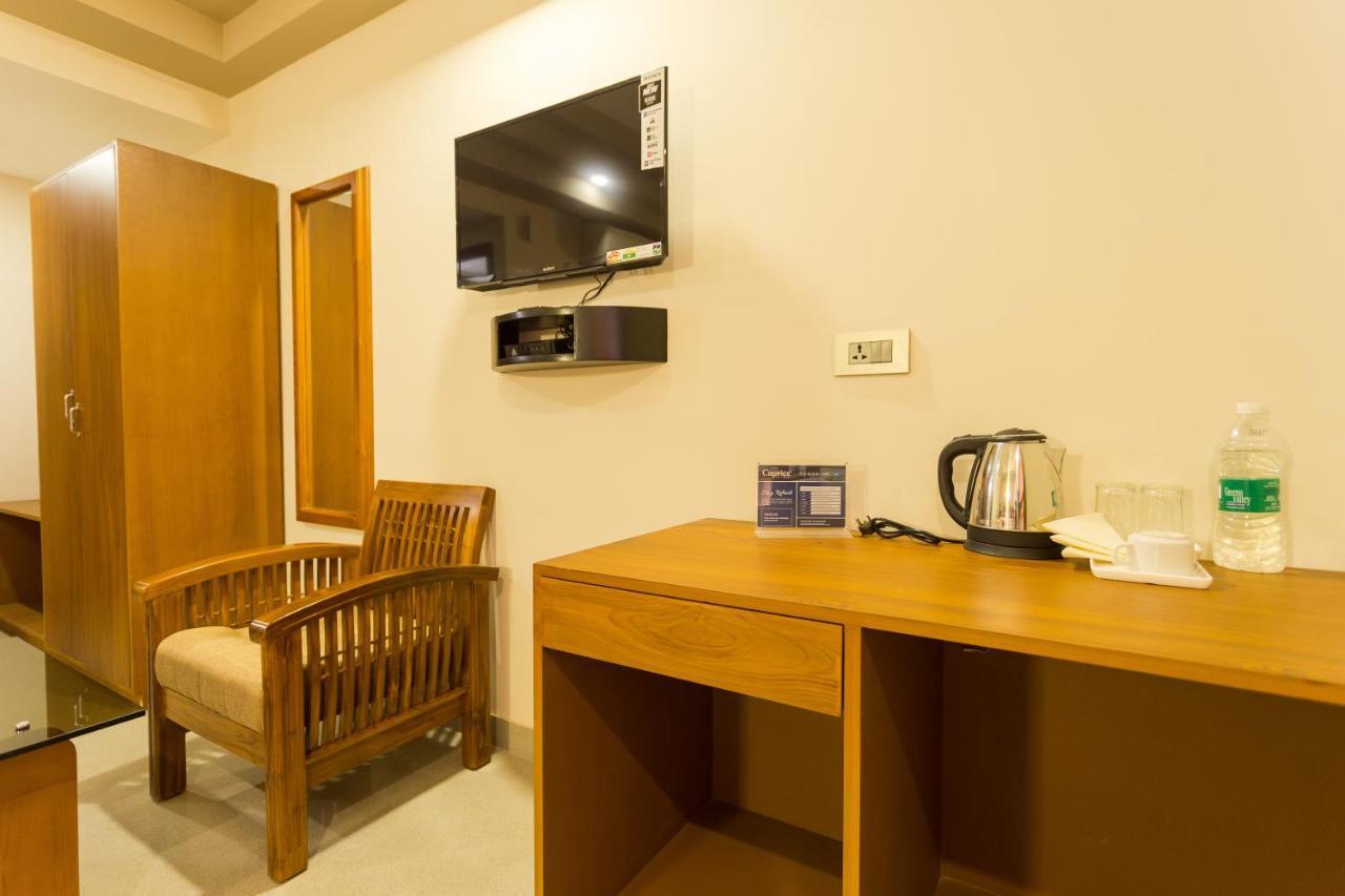 Hotel Garden Inn Коччи Экстерьер фото