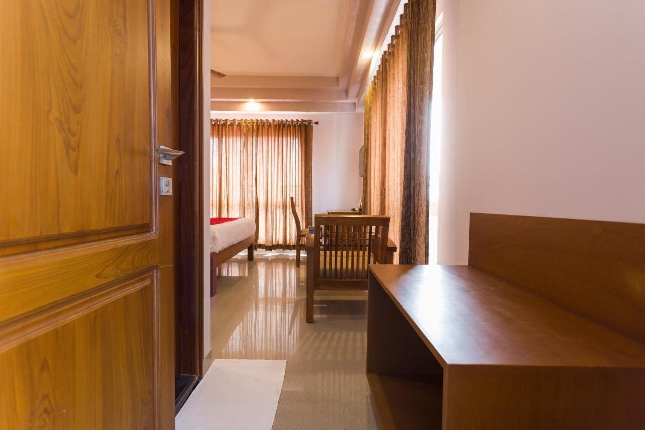 Hotel Garden Inn Коччи Экстерьер фото