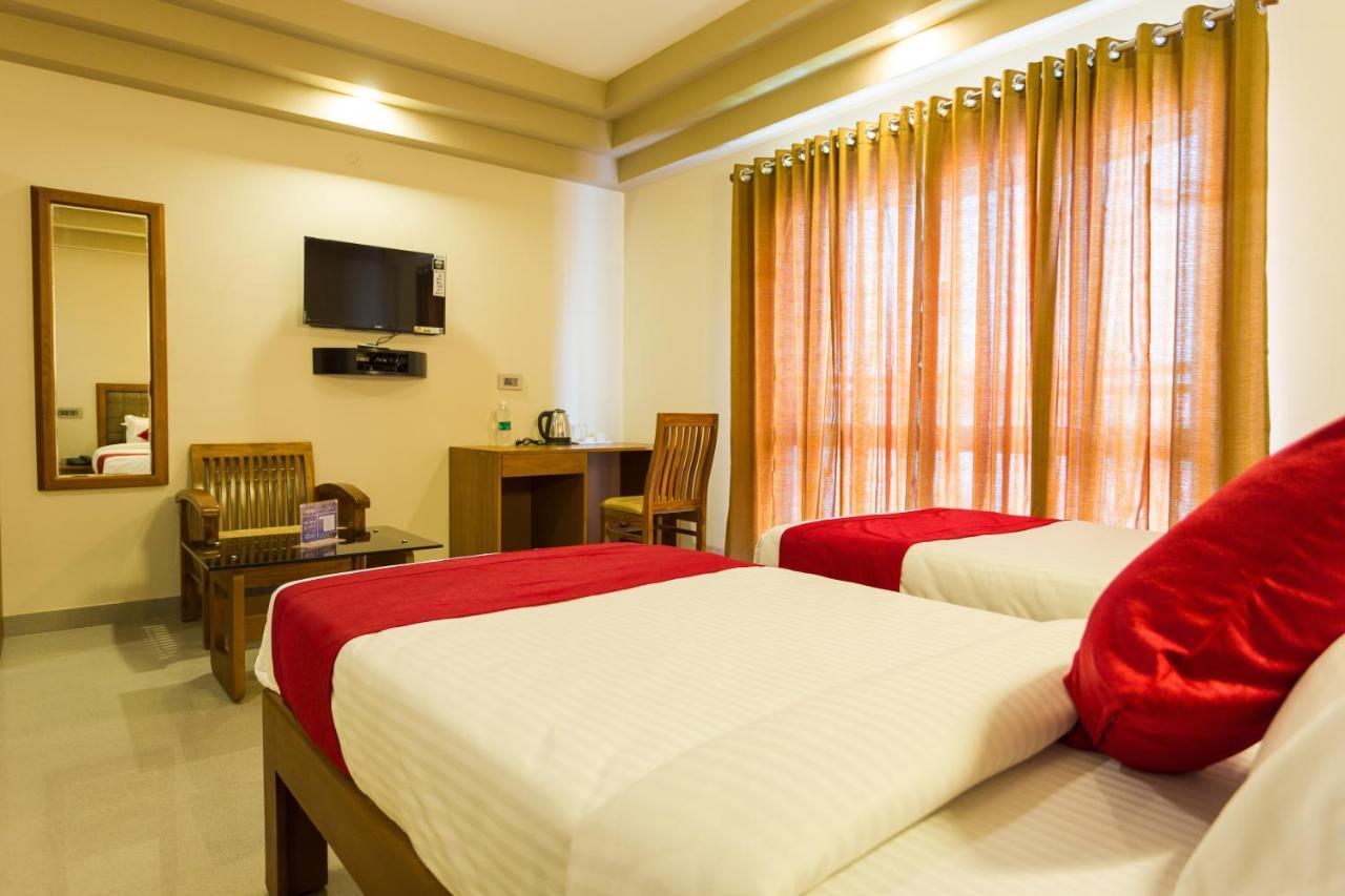 Hotel Garden Inn Коччи Экстерьер фото