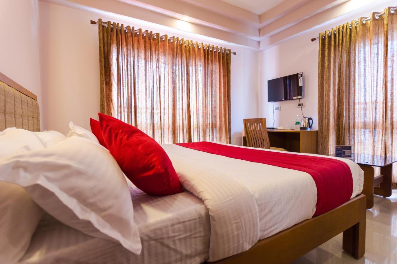 Hotel Garden Inn Коччи Экстерьер фото